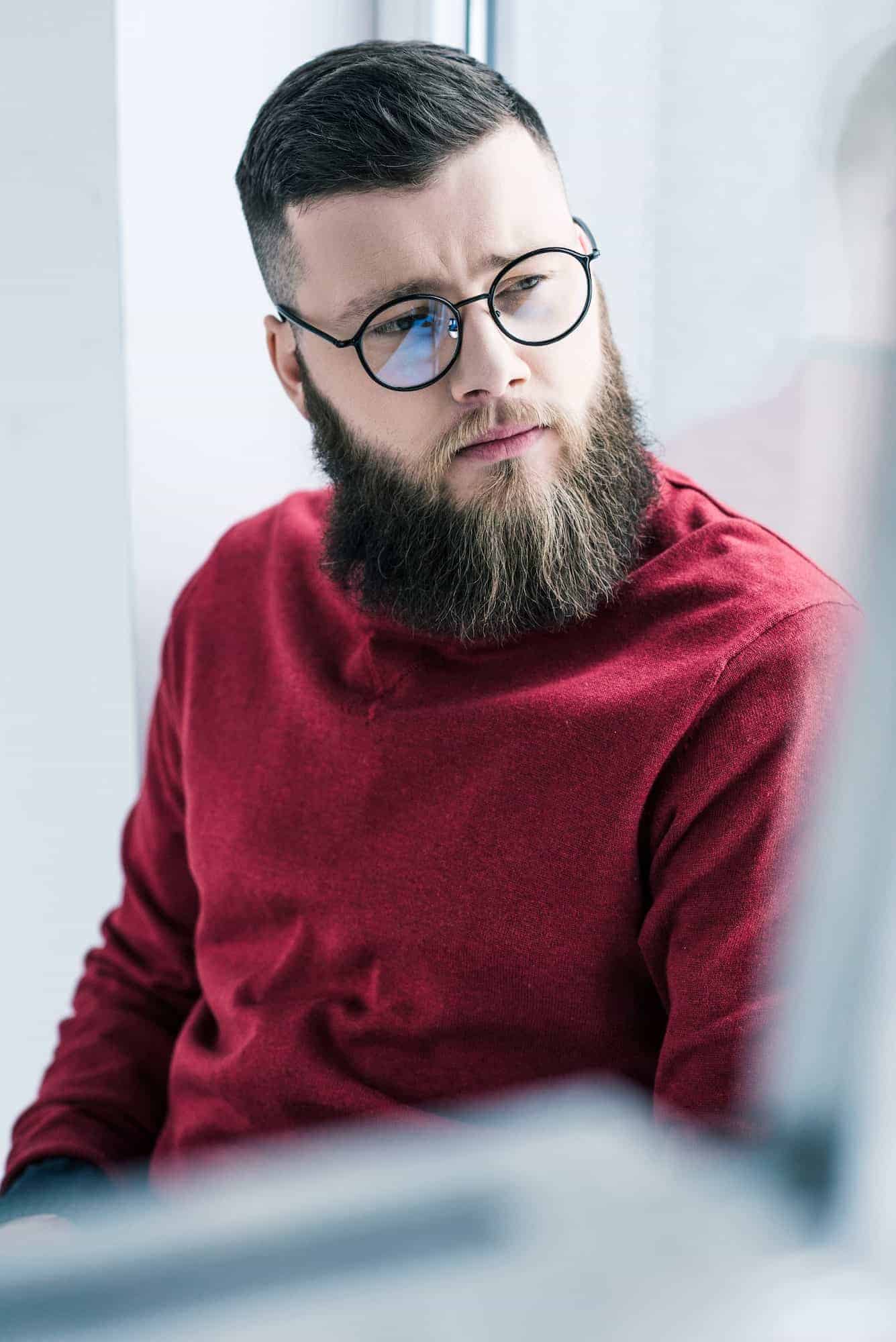 Portfolio 2 portrait of handsome pensive businessman in eyeglasses looking away